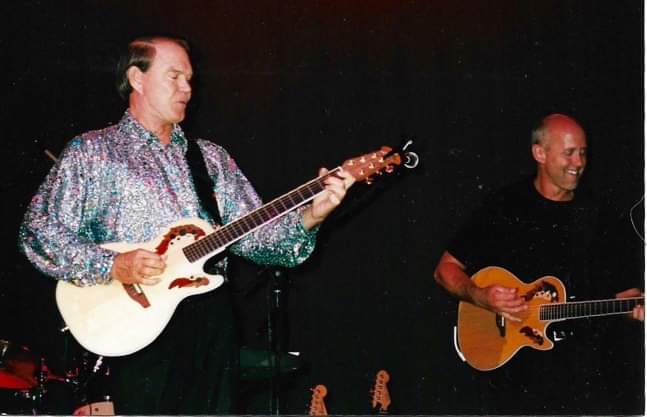 Glen Campbell with a White EA-68 Ovation Viper