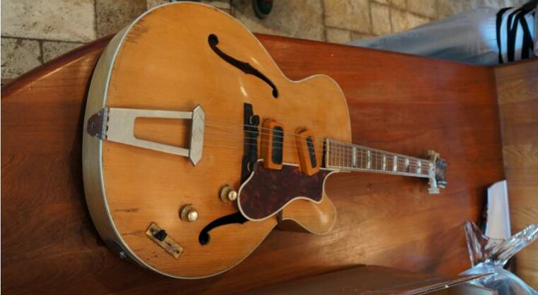 The Epiphone being "refreshed" with a clearer view of the diamond tailpiece